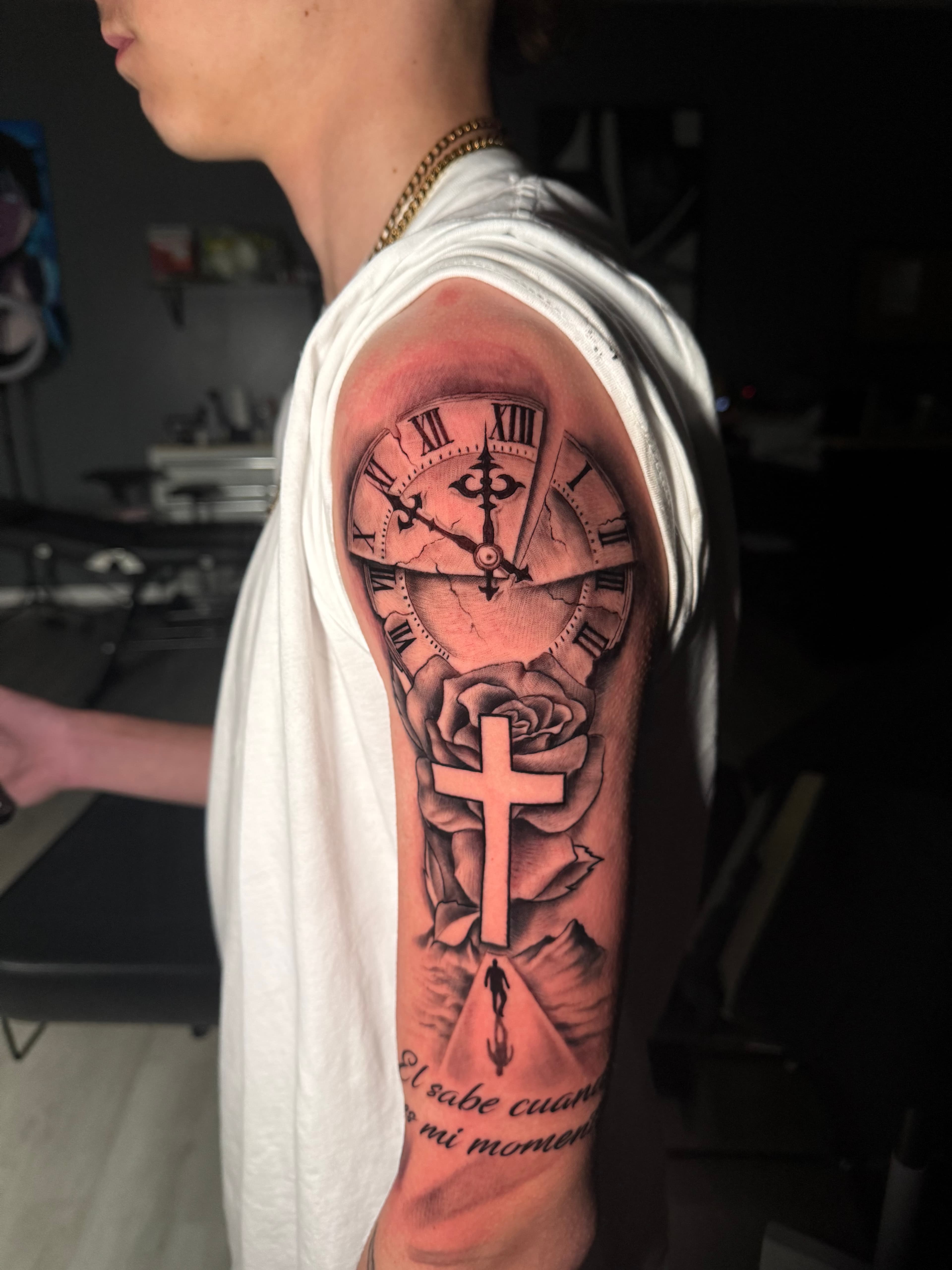 Clock tattoo on arm